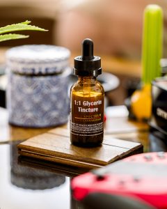 Tincture Tuesday Chronic Health 1-1 Glycerin Tincture on table - Halo Infusions. full spectrum. best tincture in arizona. tucson tincture