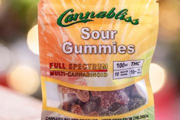 Feel The Power Cannabliss Sour Gummies - Bokeh Christmas Tree. halo infusions. full spectrum. best edibles in arizona. tucson edibles
