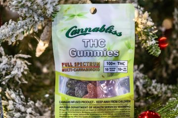 Bring Joy This Season THC Cannabliss gummies sitting in a christmas tree. halo infusions. full spectrum. best edibles in arizona. tucson edibles