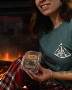 Warms You Up Luna holding the Classic Brownie - Prime Leaf collab. halo infusions. full spectrum. best edibles in arizona. tucson edibles