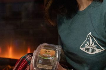 Warms You Up Luna holding the Classic Brownie - Prime Leaf collab. halo infusions. full spectrum. best edibles in arizona. tucson edibles