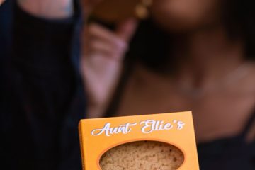 Favorite Flavor Ella eating a Homestyle PB 100mg Cookie. Aunt Ellie's. full spectrum. best edibles in arizona. tucson edibles